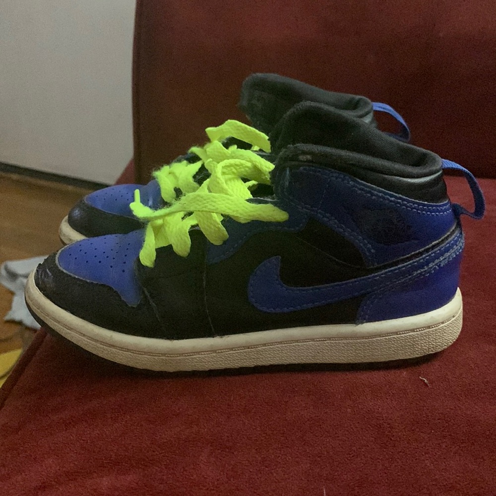 Black and blue Jordan 1’s